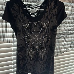 Women’s Venus tee shirt size Small but fits more like a Medium